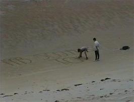 Paul and Richard leave our mark on the sand at Camusdarach Beach